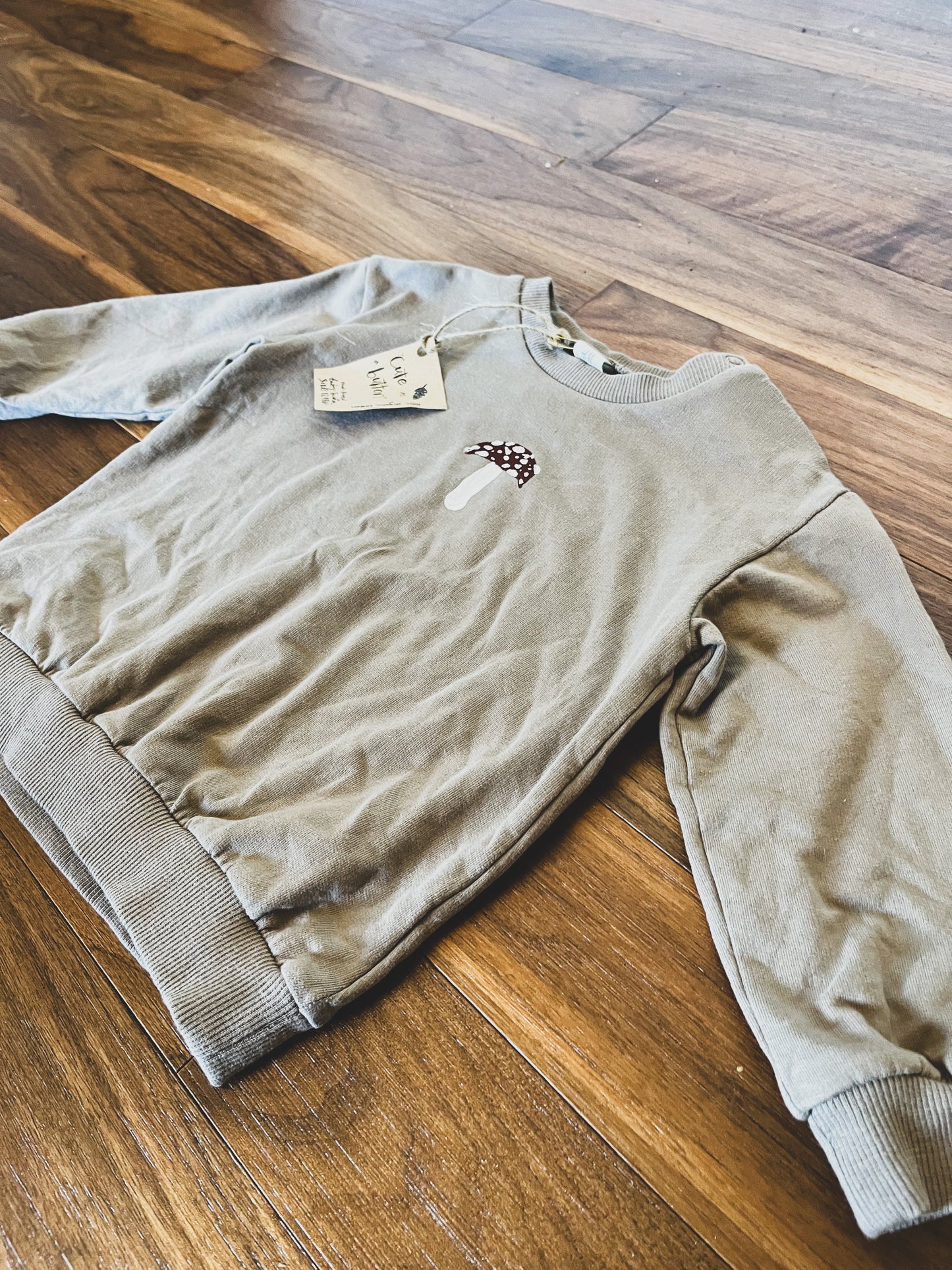 "Cute as a Button" Baby Sweater